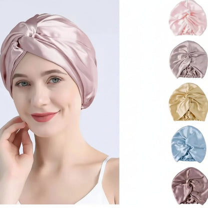 Woman wearing a pink satin head wrap with color options displayed on a white background